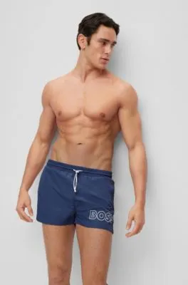 Bañador tipo shorts en tejido de secado rápido con logo en contorno
