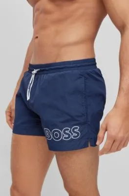 Bañador tipo shorts en tejido de secado rápido con logo en contorno