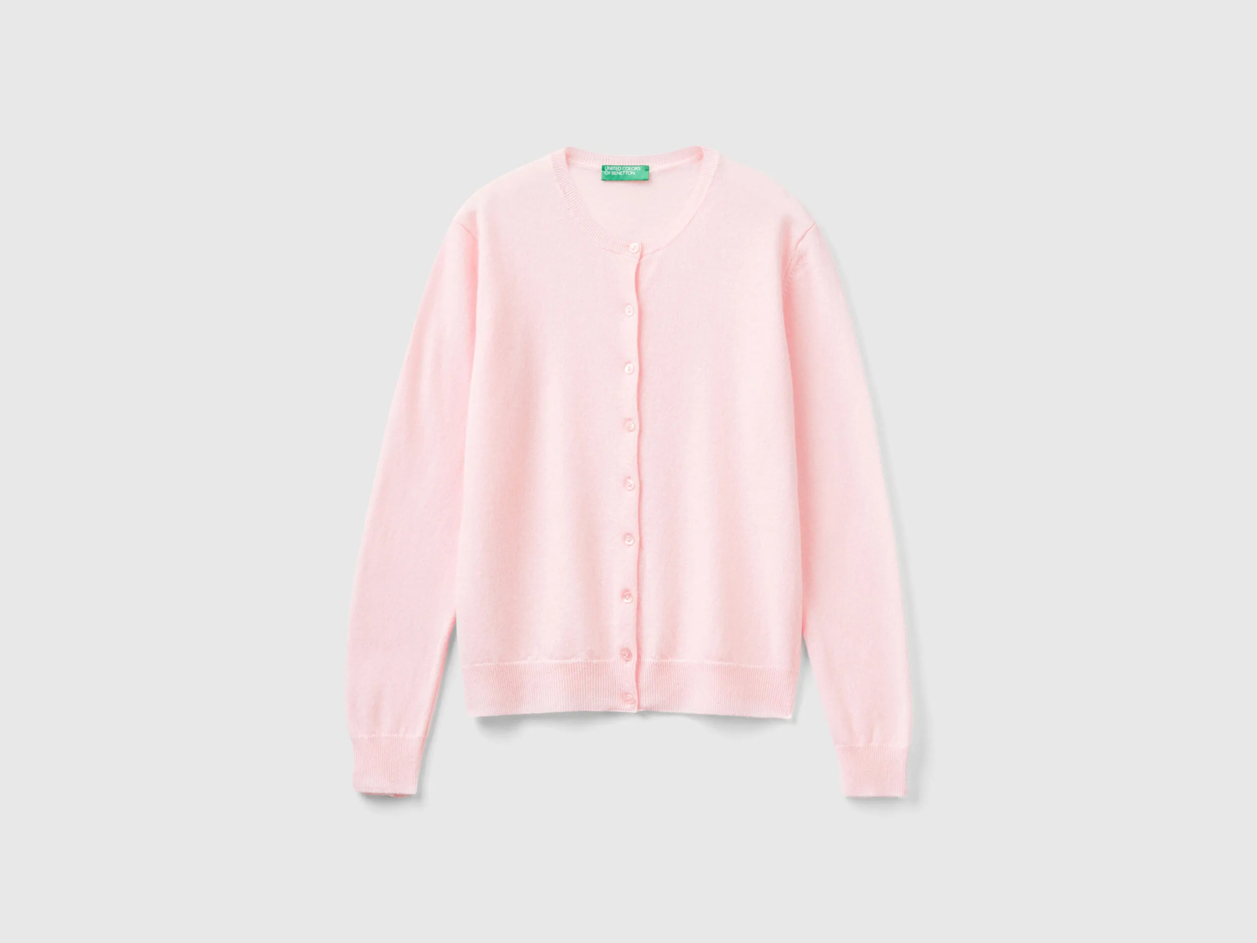 Cárdigan de cuello redondo rosa claro de pura lana merina