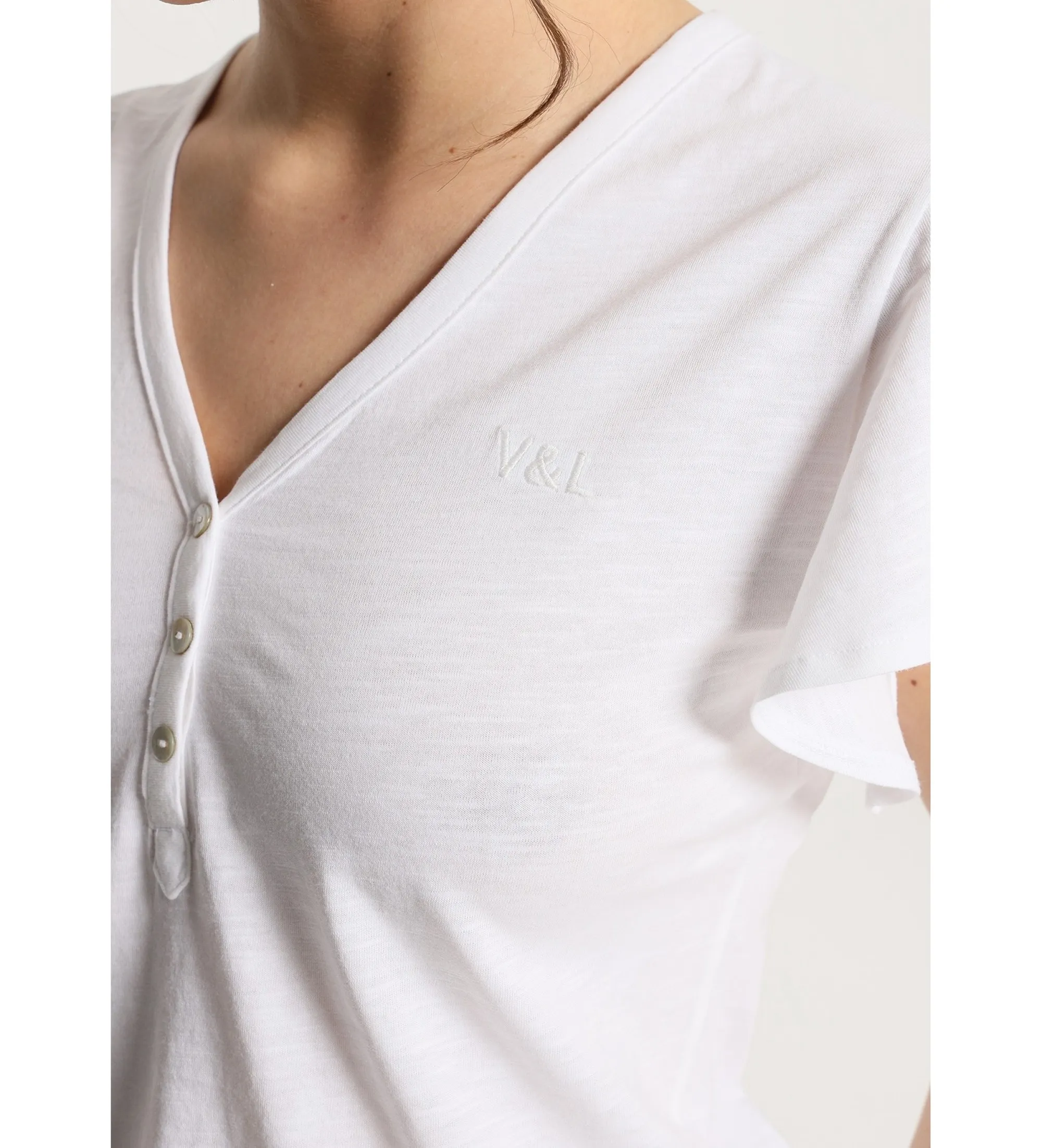Camiseta de manga corta volantes con botones blanco