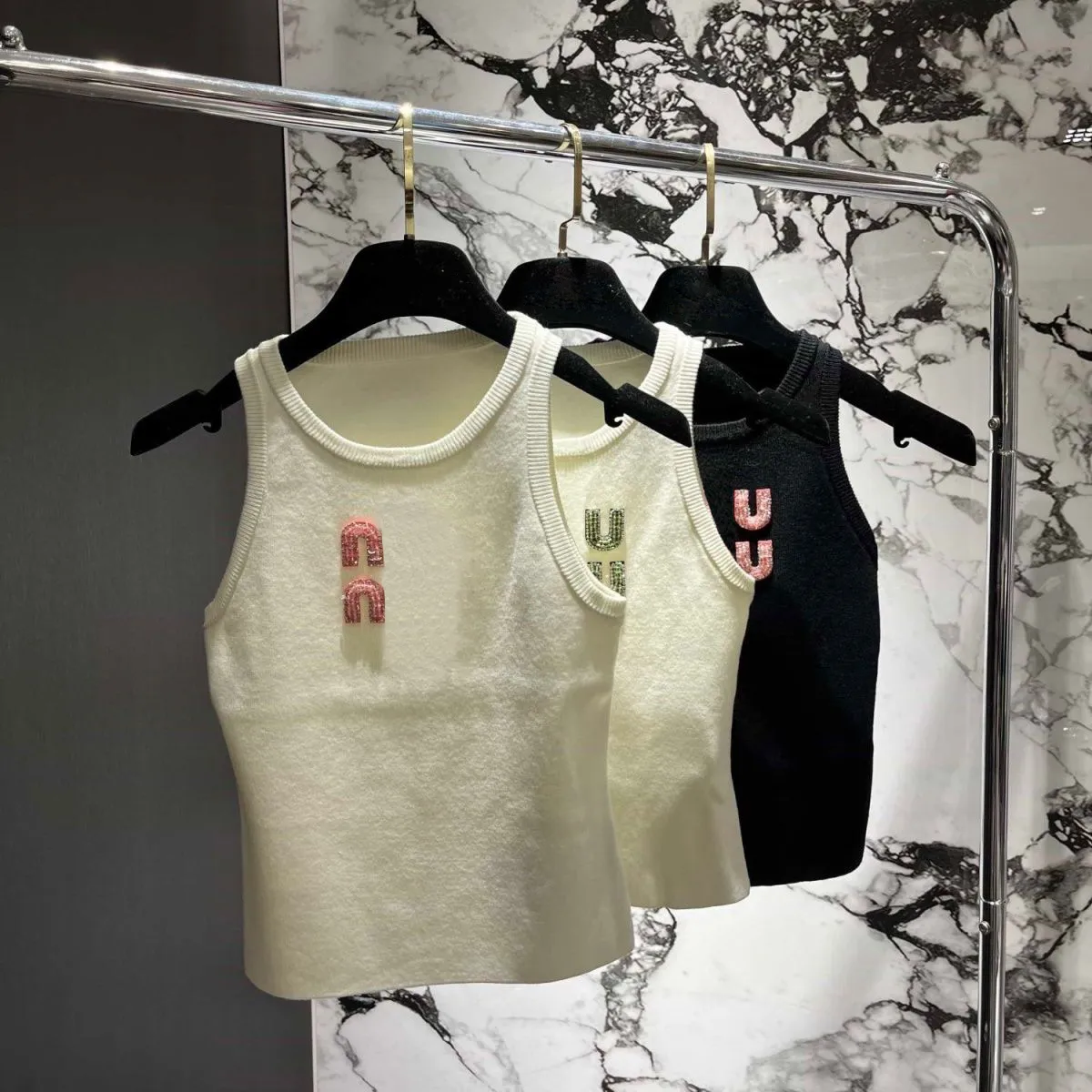 Diseñador Maneveless Knit chaleco elegante Tops de punto delgado con estilo Slim Women Camas de tejido de alta calidad