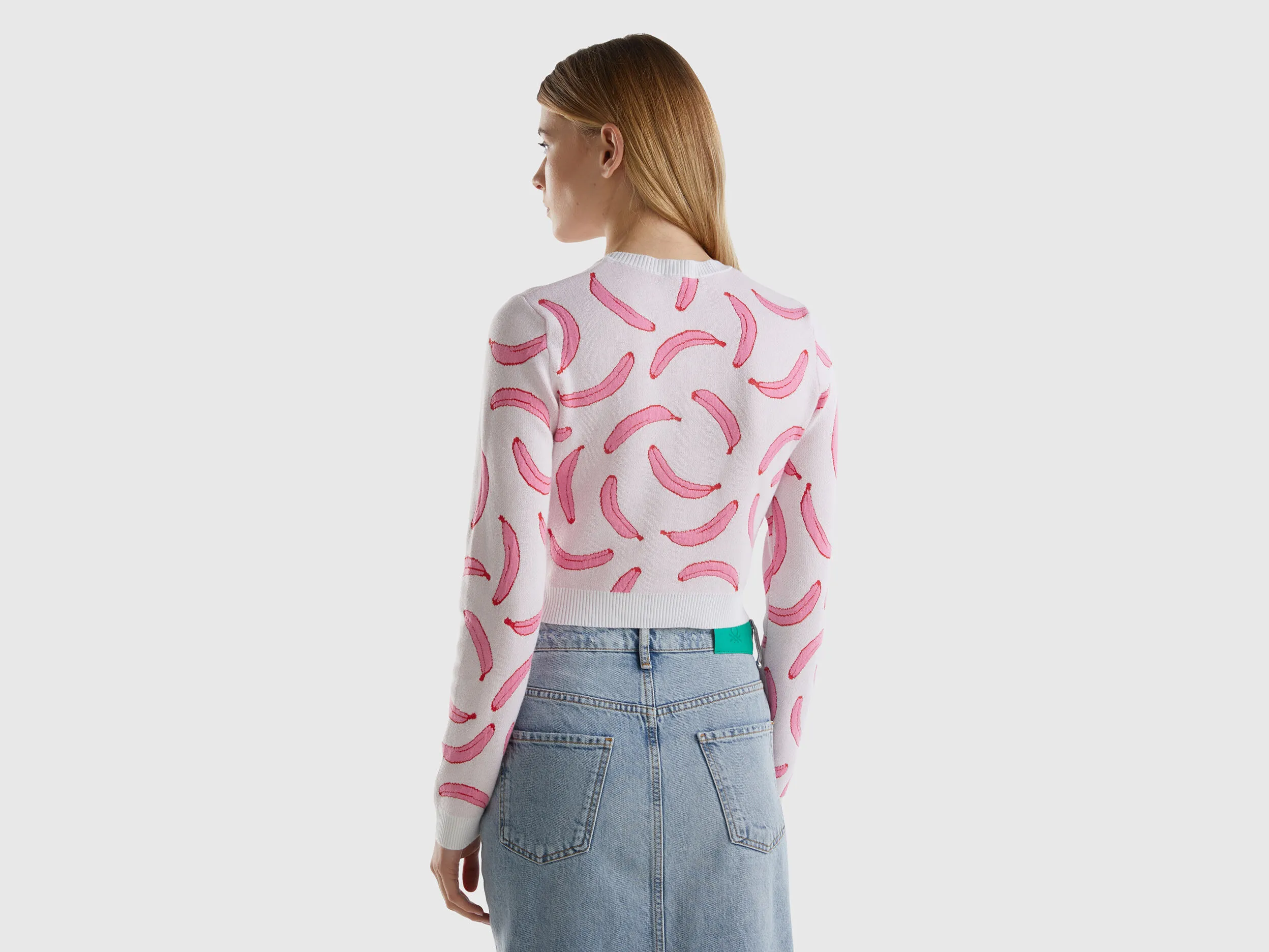 Jersey cropped rosa claro con estampado de plátanos