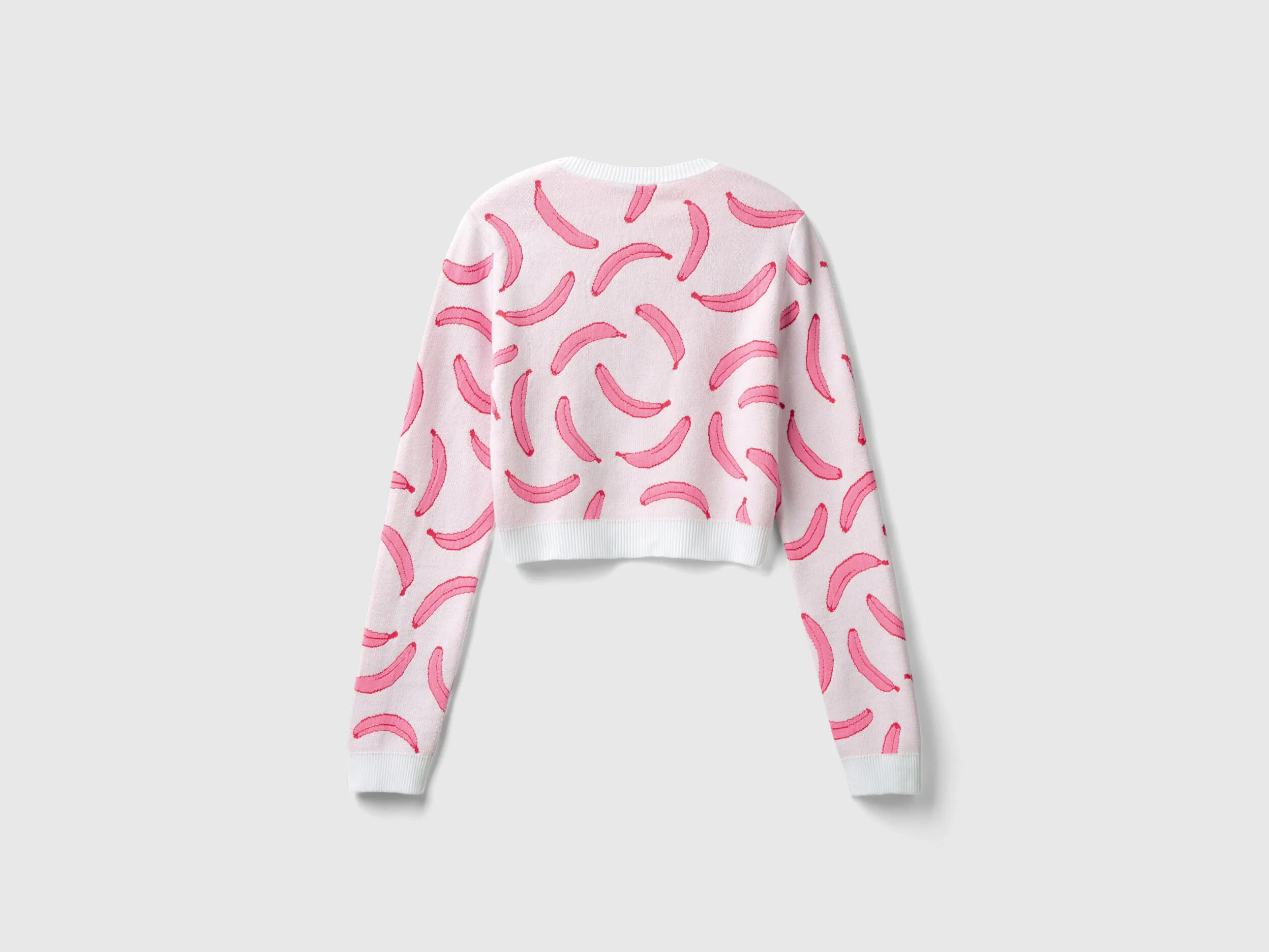 Jersey cropped rosa claro con estampado de plátanos