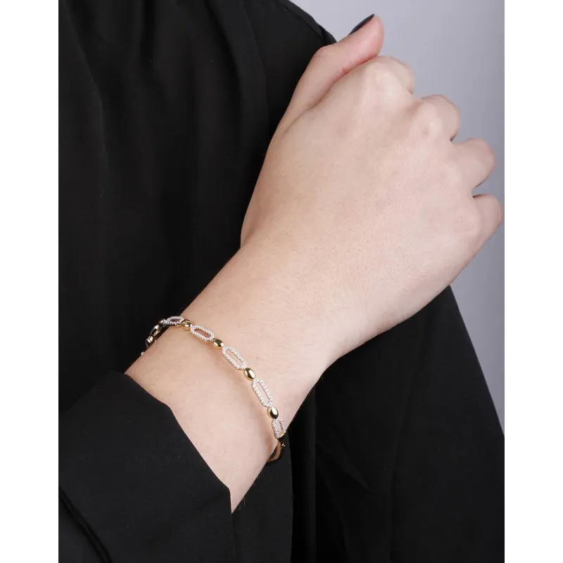 PULSERA RIGIDA ORO 18K Y CIRCONITAS