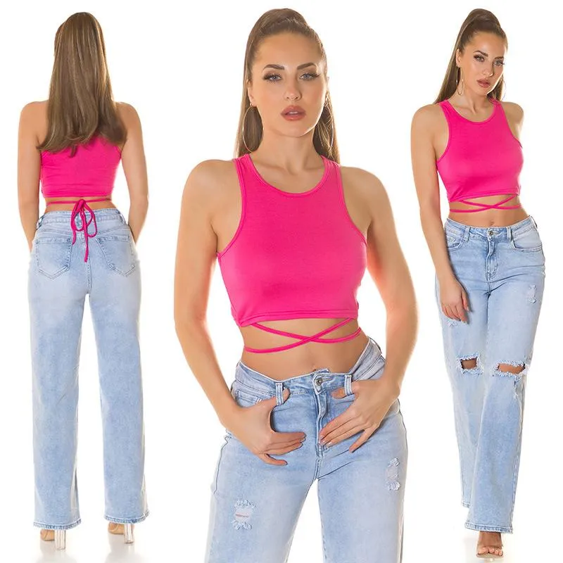 Top rosa corto con cintas decorativas